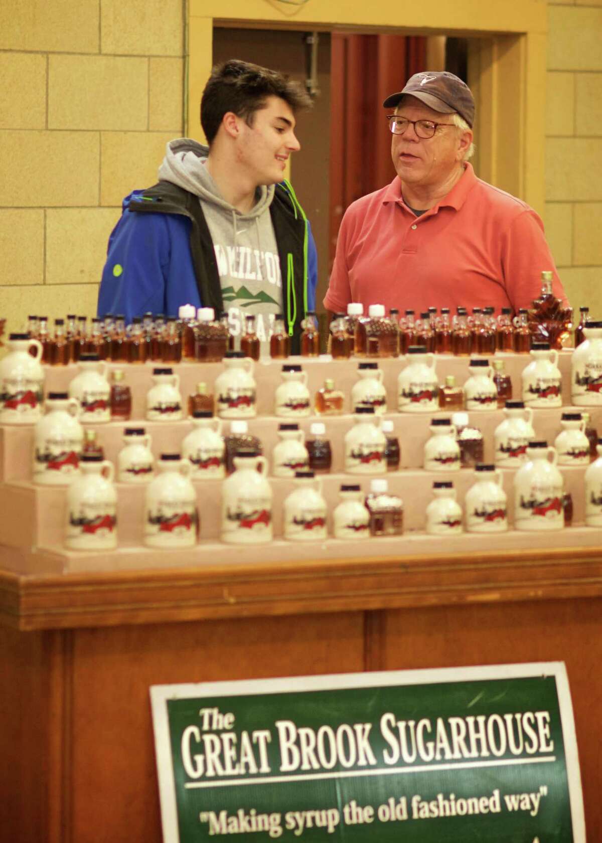 Owen Swanson from the NM Youth Agency and Mark Mankin from Sullivan Farm selling The Great Brook Sugarhouse Syrup. The New Milford Winter Market will be held Saturday, January 14th and 28th, and Saturday, February 11th and 25th from 9:00am to 1:00pm at the Catherine E. Lillis Administration Building at 50 East Street in New Milford, CT.