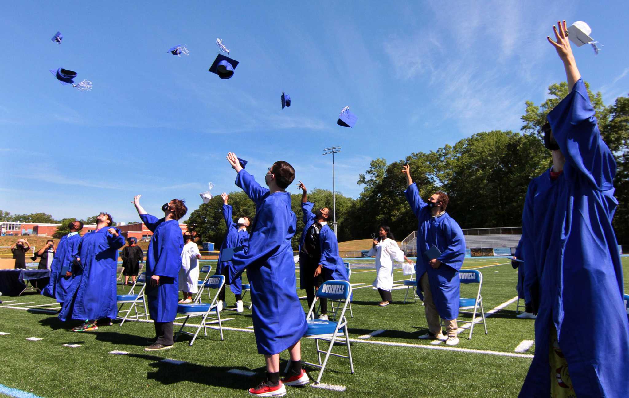 Photos: A cap toss at Bunnell High School's socially distant graduation