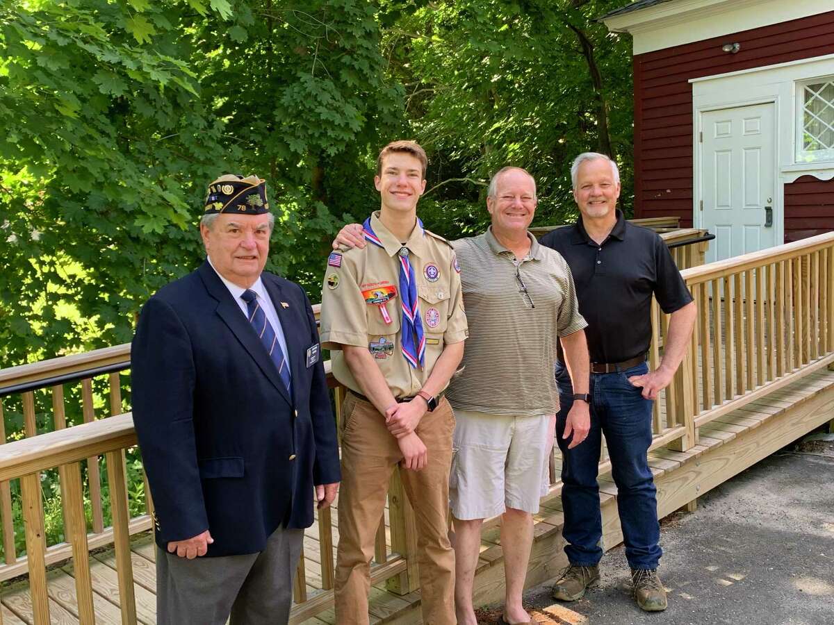 American Legion Post Commander George Besse, Eagle Scout Stephen Nazworth and scoutmasters Bryan Nazworth and Brian Stumph by the new ramp at Legion Hall on North Salem Road.