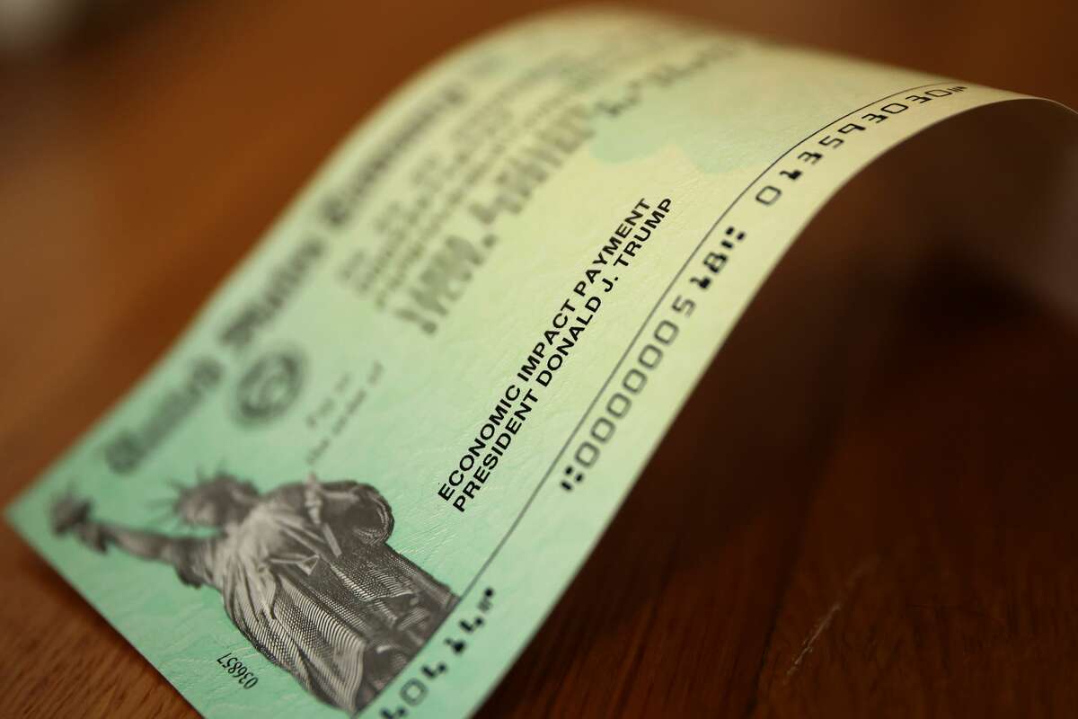 U.S. President Donald Trump's name appears on the coronavirus economic assistance checks that were sent to citizens across the country April 29, 2020 in Washington, DC.  (Photo by Chip Somodevilla/Getty Images)