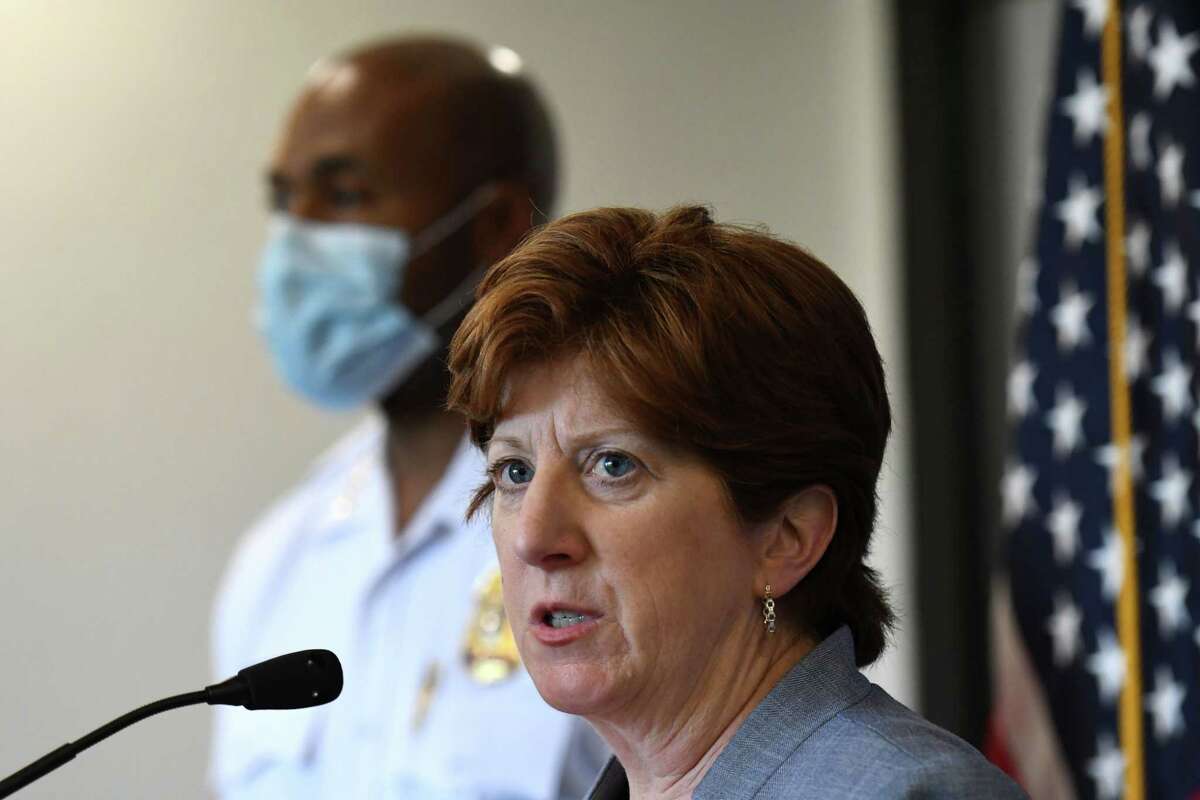 Albany Mayor Kathy Sheehan and Police Chief Eric Hawkins, left, talk to reporters during a June 25, 2020, news conference at police headquarters. The two are facing pressure to address the racial disparities in marijuana arrests in the city. Between last summer and this summer, 97 percent of the people arrested on marijuana charges in the city were Black. (Will Waldron/Times Union)