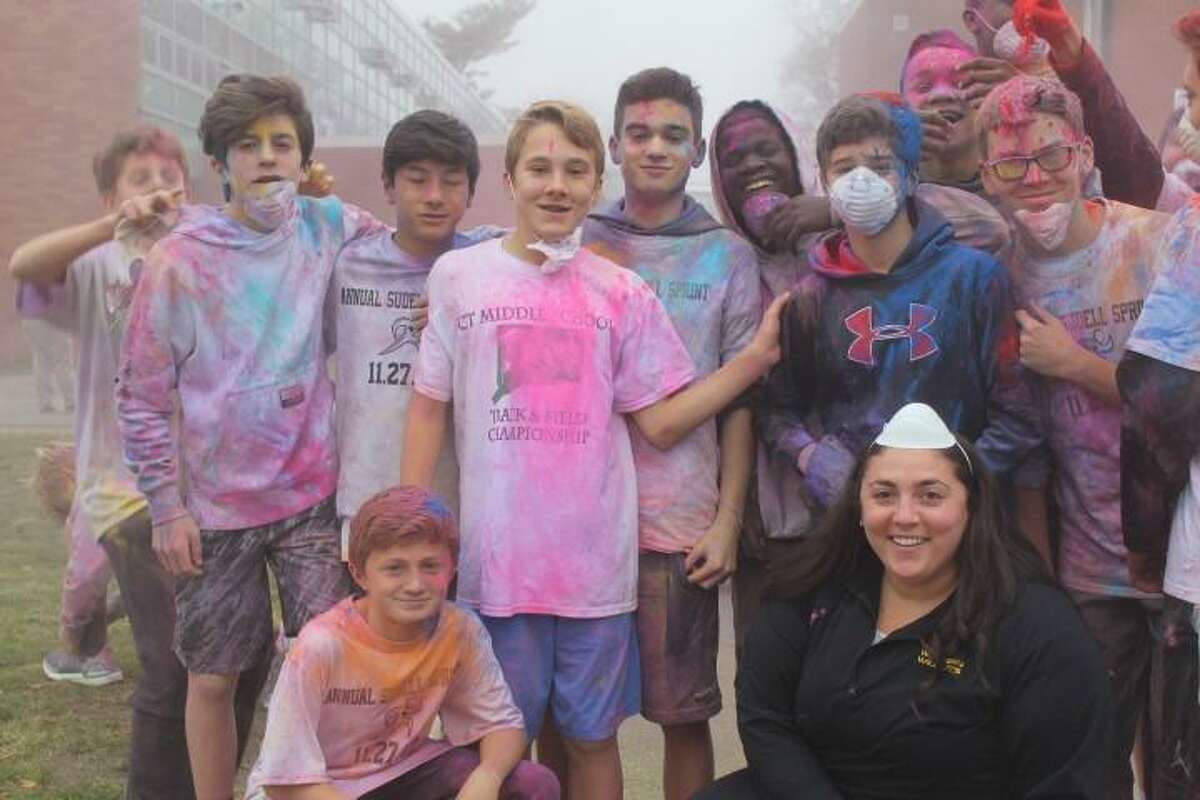 Western Middle School counselor Erin Montague and her students at a color run.
