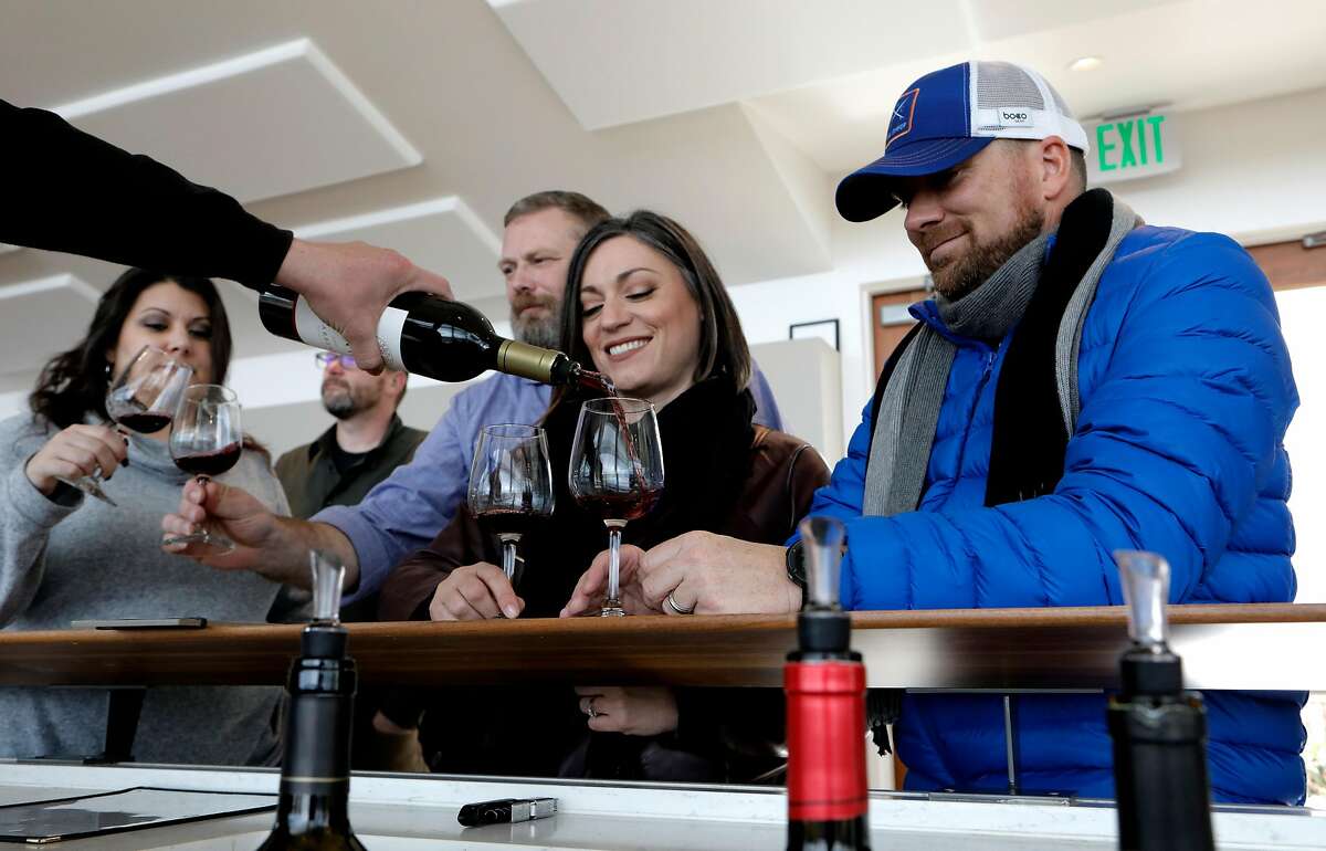 Lisa and Chris Nottingham sample wines at the Iron Hub tasting room in Plymouth, Ca., on Sun. Feb. 17, 2019.