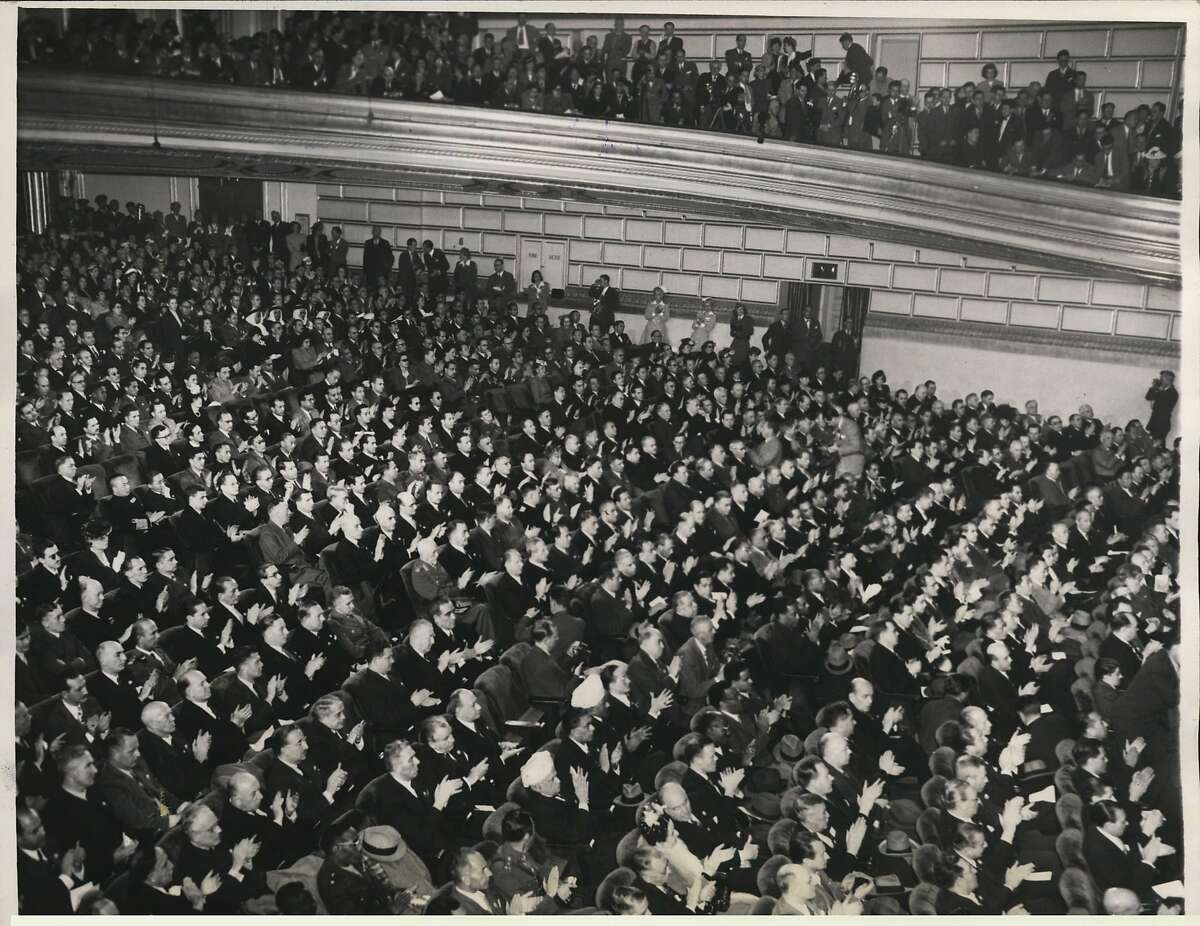 United Nations Peace Conference. San Francisco, California. Delegates of the forty four nations attending the opening session of the United Nations conference for world security in the San Francisco War Memorial Opera House today ... The delegates were listening to the broadcast address of President Truman at the time this photograph was taken.