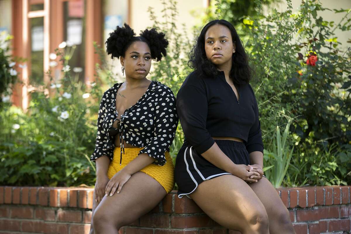 From left: A portrait of Tamia Proctor and Isabella Lawrence and outside the Lakeview branch of the public library on Thursday, June 25, 2020, in Oakland, Calif. They are former employees at Boba Guys. They said they faced racism from customers and no support from managers when they reported problems.