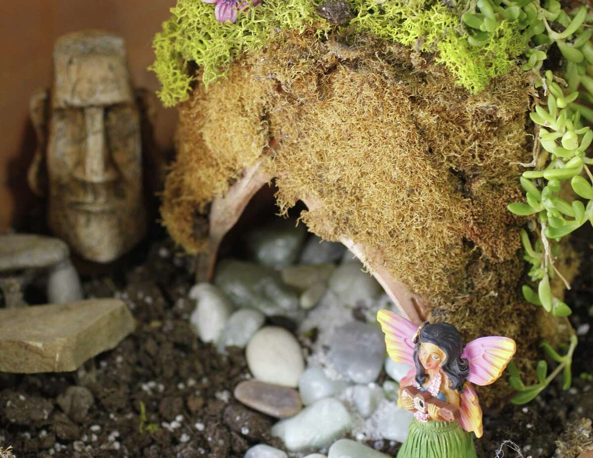 Fairy gardens can be designed with cool little accessories like these from Maas Nursery in Seabrook, but kids can create them with items from their toy collection.