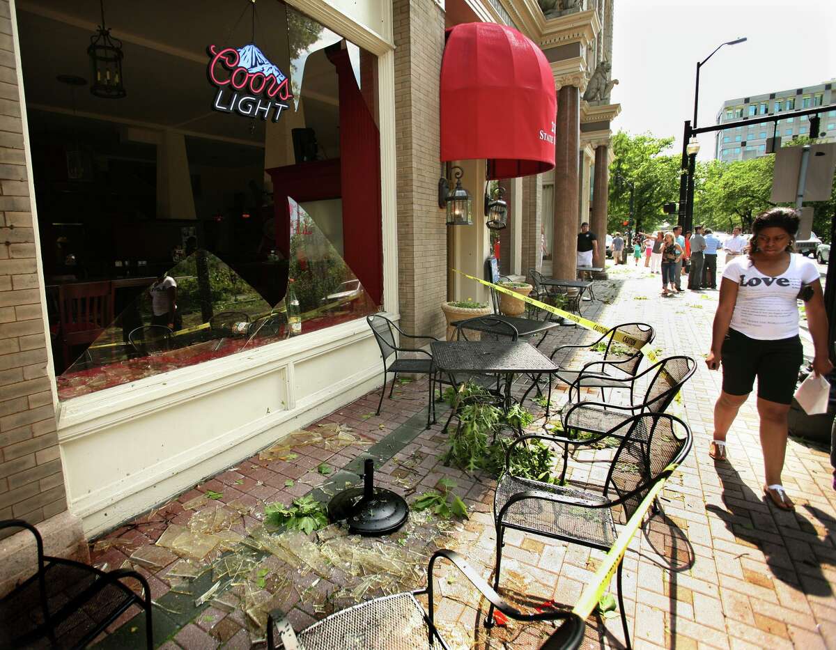 A picture window at Tiago's Bar & Grill at 211 State Street in downtown Bridgeport shattered during a violent afternoon thunderstorm, Thursday, June 24, 2010.