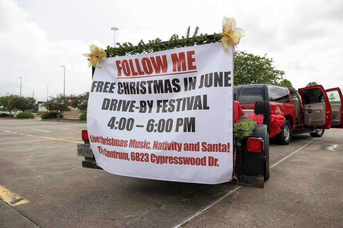 A trailer leads a car parade hosted by Cypress Creek Christian Church in Spring, Thursday, June 25, 2020. Over 60 vehicles participated in the Christmas car parade which ran for an estimated four miles.