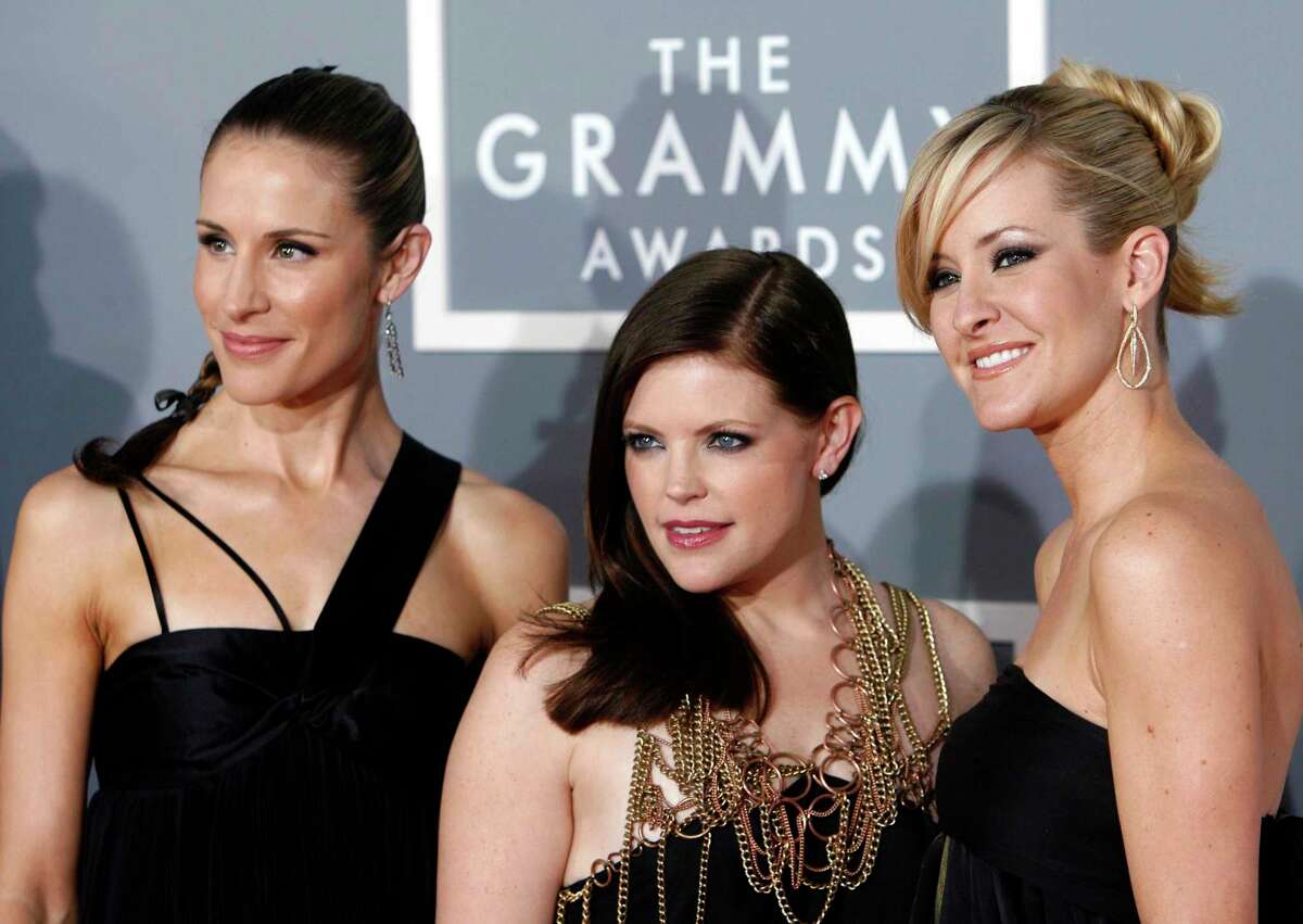 Emily Robison, left, Natalie Maines, center, and Martie Maguire, released a new single this week and debuted their new band name, which dropped the Dixie but kept the Chicks.