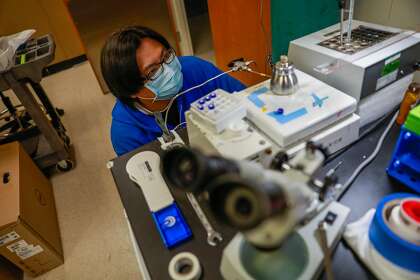 Research technologist Kuei-ho Chen runs an experiment at Nevan Krogan’s lab at UCSF. The UCSF-led teams have created the first map of the virus’ mechanisms and used the map to pinpoint 10 existing drugs that kill the virus in lab tests.