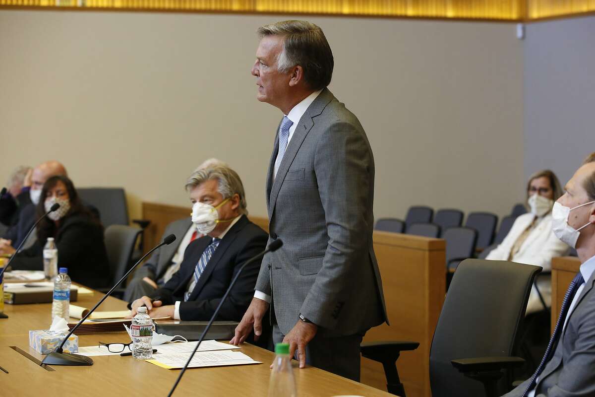 Bill Smith, interim chief executive officer and president of PG&E Corp., makes a closing statement during the criminal sentencing hearing in the trial of Pacific Gas & Electric Corp in Chico, Calif., Thursday, June 18, 2020. Pacific Gas & Electric on Thursday was fined $4 million for the deaths of 84 people killed in a nightmarish Northern California wildfire ignited by the its long-neglected electrical grid. The sentencing comes as the nation's largest utility prepares to end a 17-month bankruptcy proceeding triggered by the catastrophe. (AP Photo/Rich Pedroncelli, Pool)