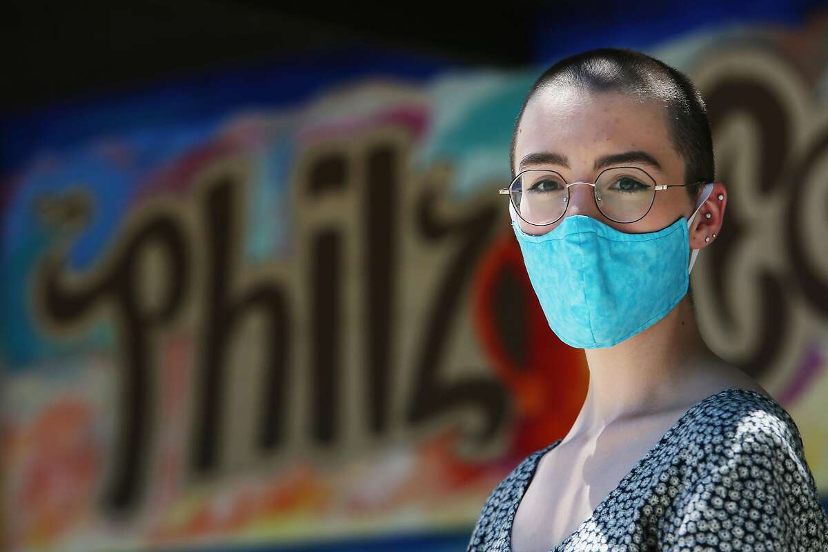 Emily Hering, Philz Coffee barista, stands for a portrait in front of Philz Coffee on Monday, June 22, 2020 in Palo Alto, Calif.�Hering does not want to go back to work because of COVID-19 and because she has underlying medical conditions that make her more susceptible.