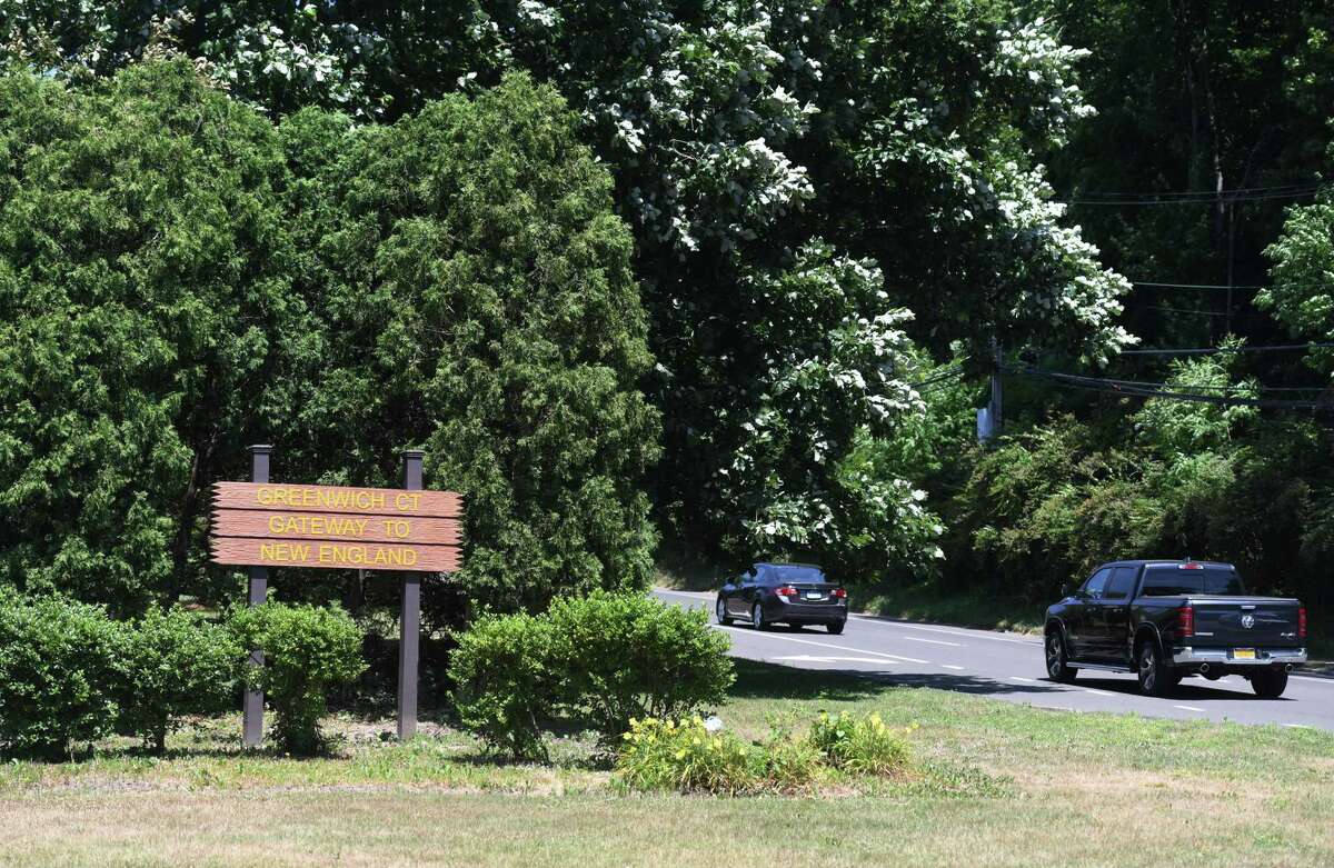 A sign welcomes drivers to Greenwich, Conn. along Route 1 at its border with Port Chester, N.Y. on Wednesday, June 24, 2020. Ever since the coronavirus pandemic hit the northeast, Greenwich has seen an increase in people coming from New York to buy and rent homes and condos.