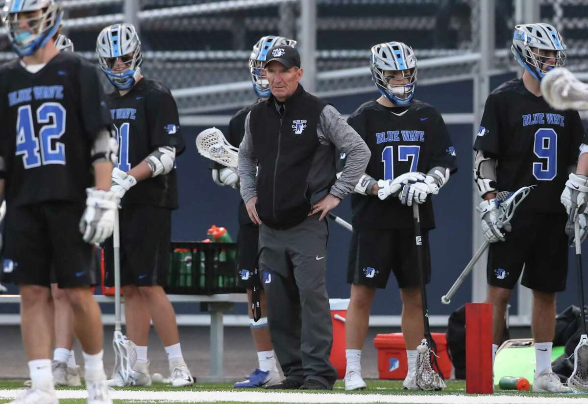 Darien coach Jeff Brameier watches the game play during a game against Wilton on April 18, 2019 at Wilton High School.