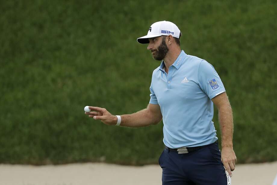 Dustin Johnson finishes his 3-under-par round of 67 that gave him a one-stroke victory over Kevin Streelman in Connecticut. Johnson extended his career-long season victory streak to 13. Photo: Frank Franklin II / Associated Press