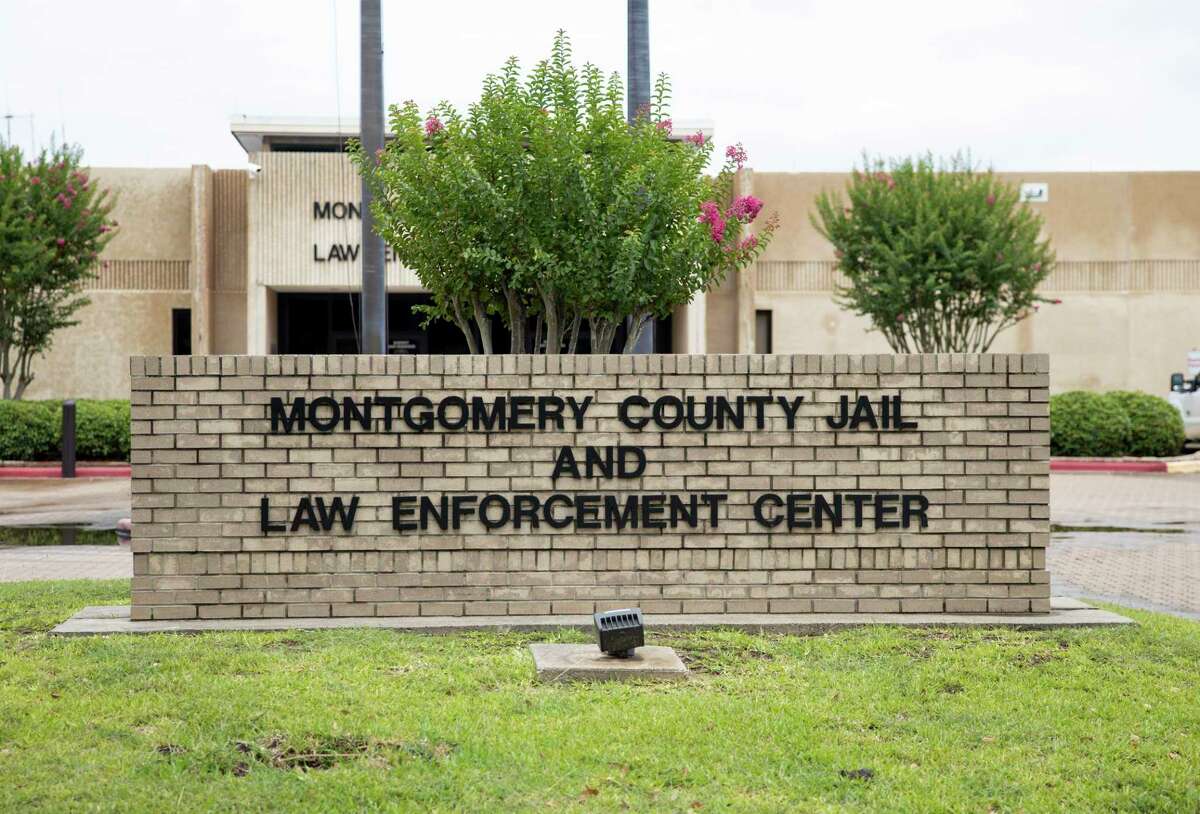 A brick sign stands outside of the Montgomery County Jail in Conroe in 2020. A Conroe man is being held there, charged with possession of child pornography, following an investigation that concluded in May.