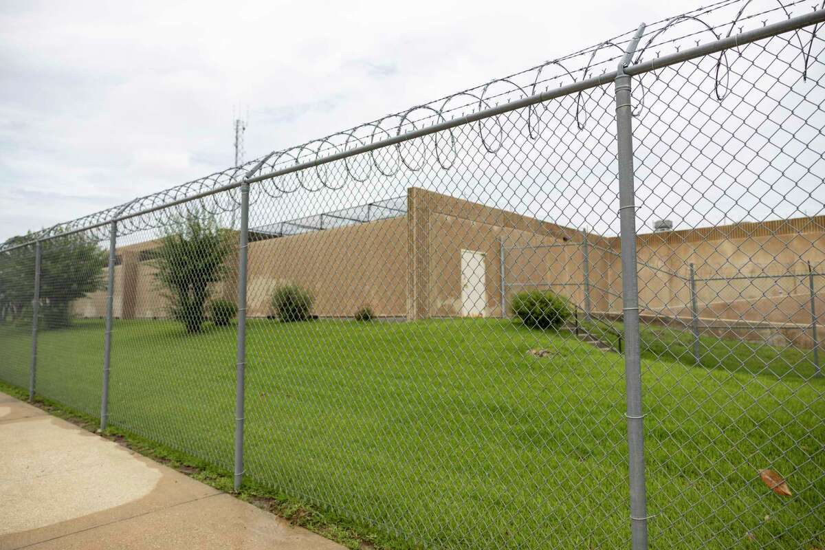 A barbed wired fence surrounds the Montgomery County Jail in Conroe, Thursday, June 25, 2020.