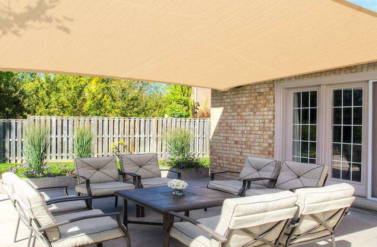 MOVTOTOP Sun Shade Sails 12x16 FT Rectangle Price: $55.99 For those who are looking for shade/coverage from the rain, but don't want an unsightly looking canopy in their yard, this MOVTOTOP Sun Shade Sails Rectangle is a good option. It covers 12 x 16 feet and comes with 4 stainless steel D-rings in the corners, and bonus with 4 x 6.6ft PE Ropes to hang for easy installation.