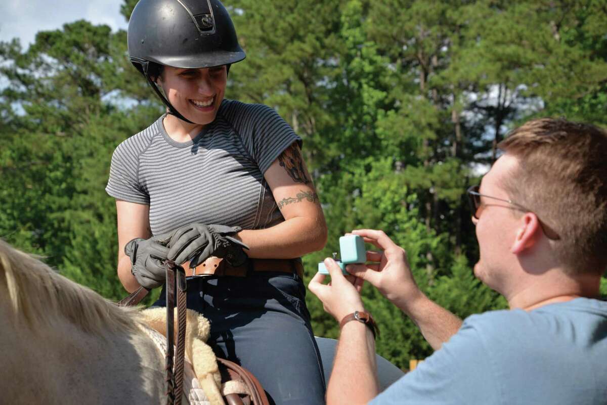 Kevin Bryant proposed to Madeline “Maddie” Webb in the arena at Chancel Stables in Fairburn, Ga.
