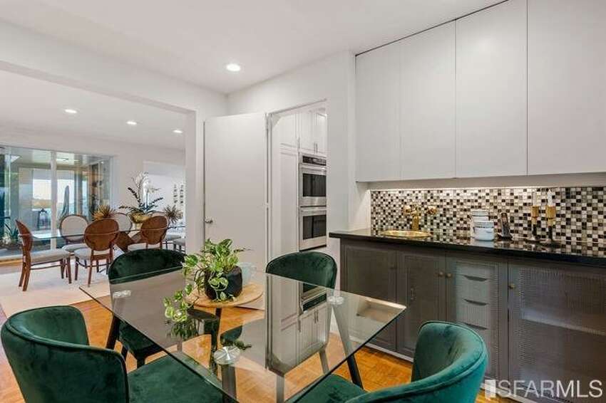 Off the kitchen is an informal eat-in area as well as a more formal dining room.