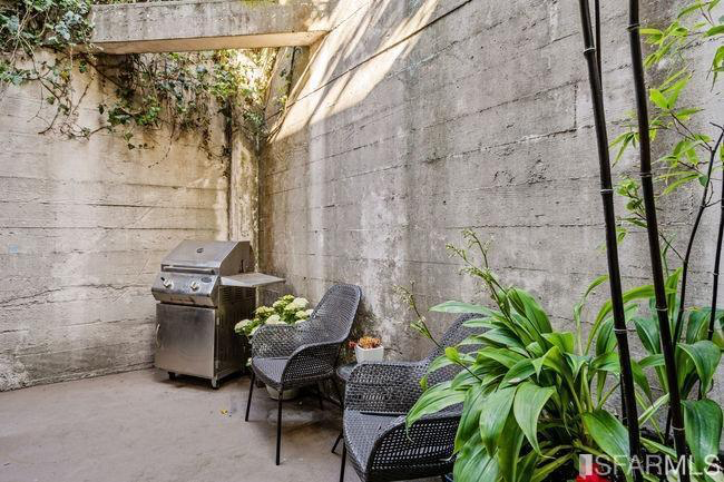 The informal eat-in area has sliding glass doors that lead out to the private patio.