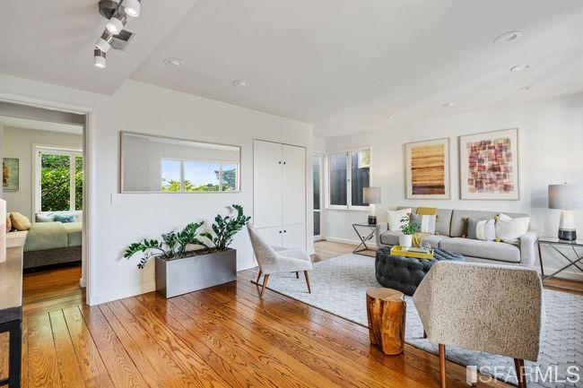 This upper level has two more bedrooms as well as a large sitting room.