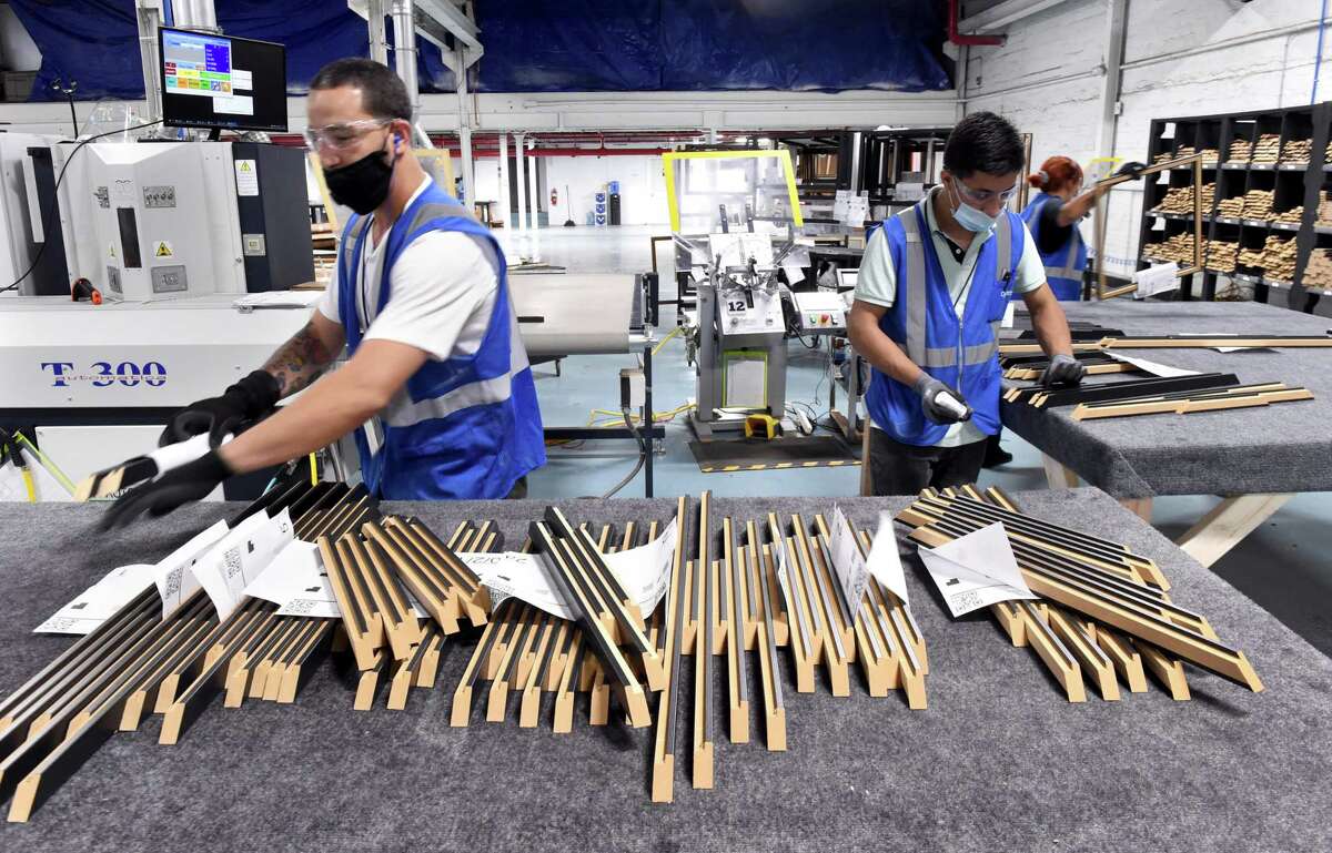 Components for custom frames are made at the newly opened Art To Frames factory in the Fair Haven section of New Haven on June 29, 2020.