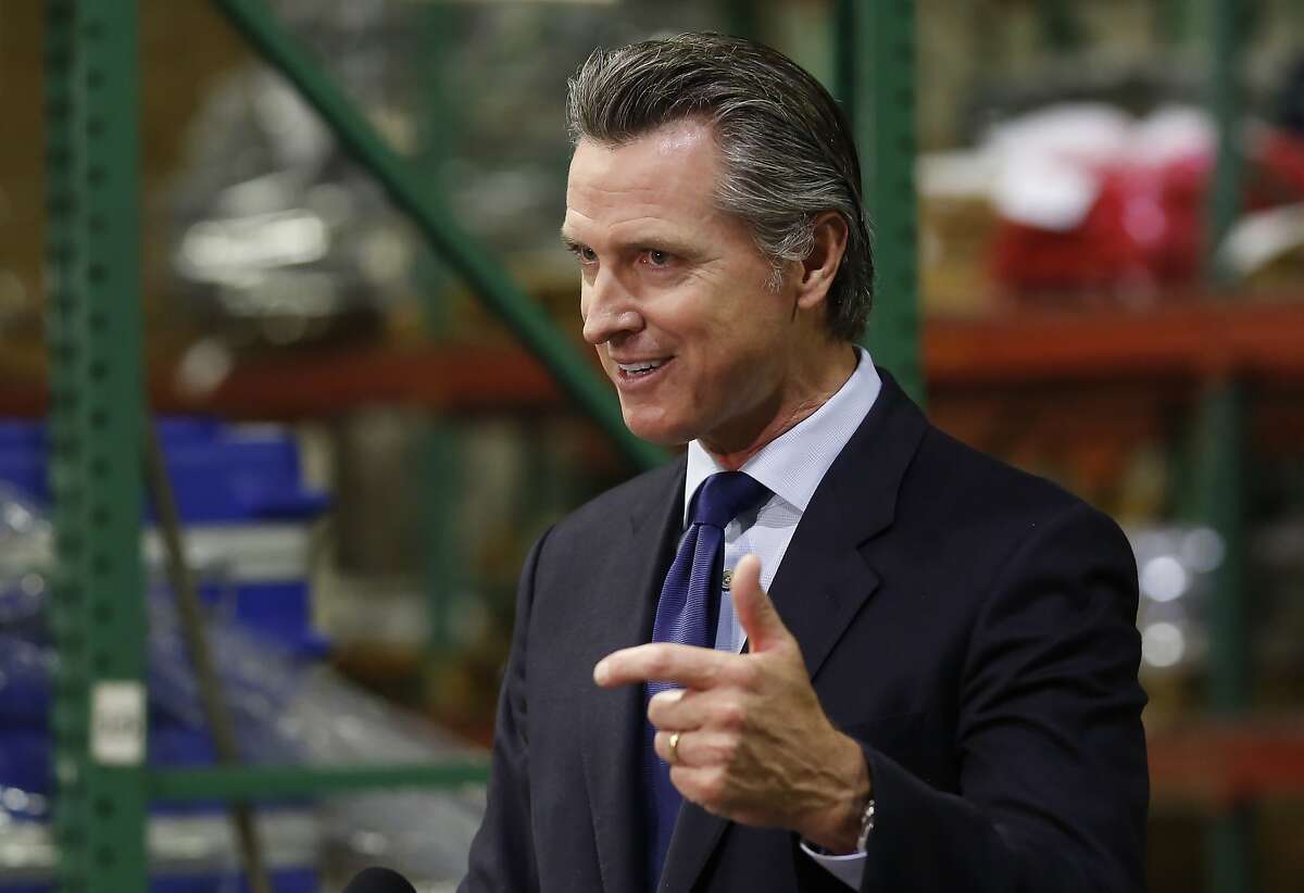 Gov. Gavin Newsom gives an update in Rancho Cordova, Calif., Friday, June 26, 2020, on the state's response to the coronavirus pandemic. Newsom said he wants Imperial County in Southern California to reimpose a stay-at-home order amid a surge in positive coronavirus tests. He also said he expects more counties to consider slowing or rollin back on reopening if necessary. (AP Photo/Rich Pedroncelli, Pool)