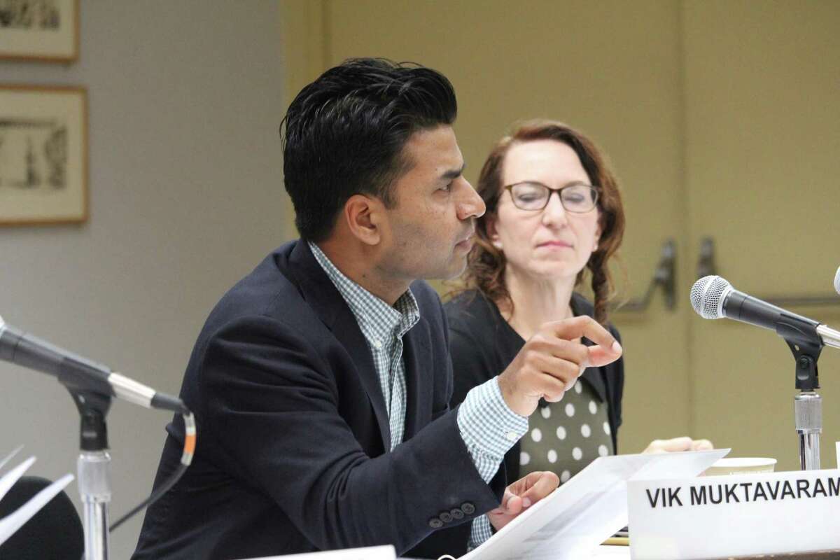 School board member Vik Muktavaram asks a question at their day-long work session.