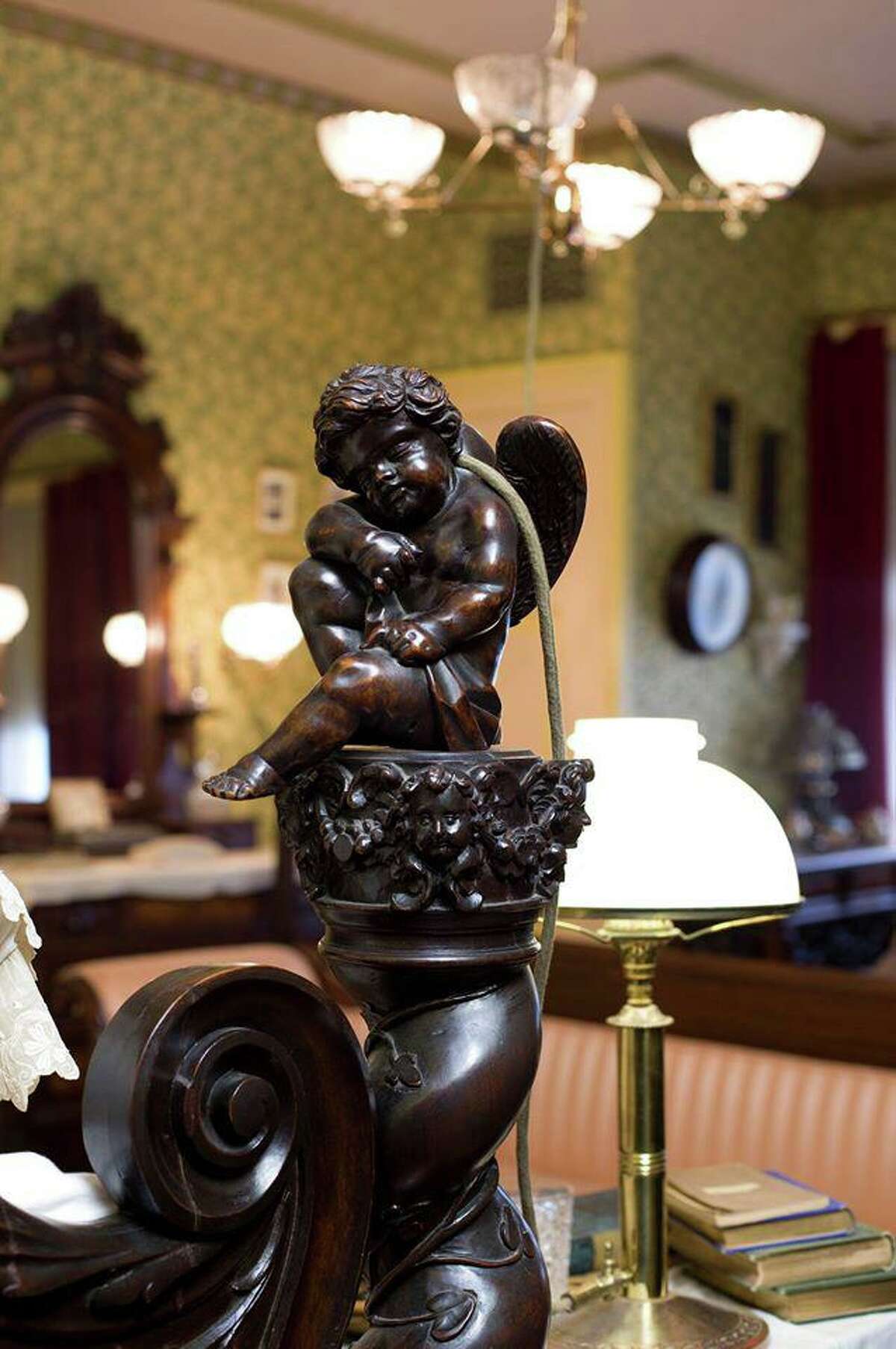 The Mark Twain Mansion in Hartford is open for limited capacity, socially distant tours. A carved angel that’s part of Twain’s “angel bed” is seen here. The angels on his bed are removable; his daughters used to play with them.