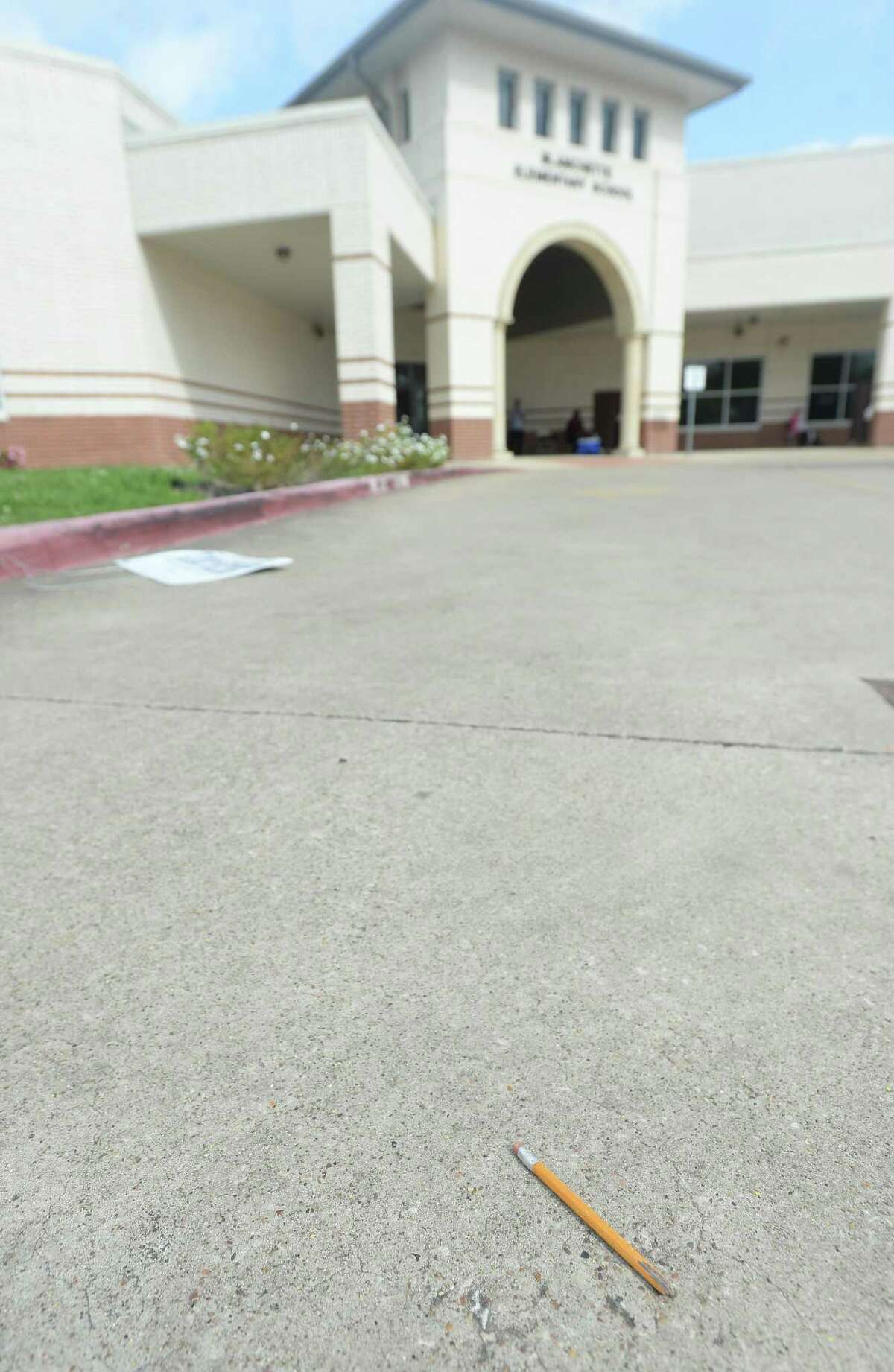 A lone pencil lies inn the drive at Blanchette Elementary School Tuesday, which was the first day of food distribution for Beaumont children. Photo taken Tuesday, March 24, 2020 Kim Brent/The Enterprise