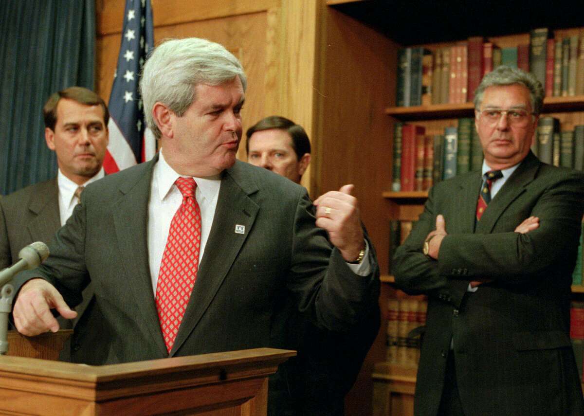 In taking over the House of Representatives in 1995, the new speaker, Newt Gingrich, gestures toward the GOP leadership team: House Majority Leader Dick Armey of Texas, right; Rep. John Boehner of Ohio, left; and Majority Whip Tom DeLay of Texas.