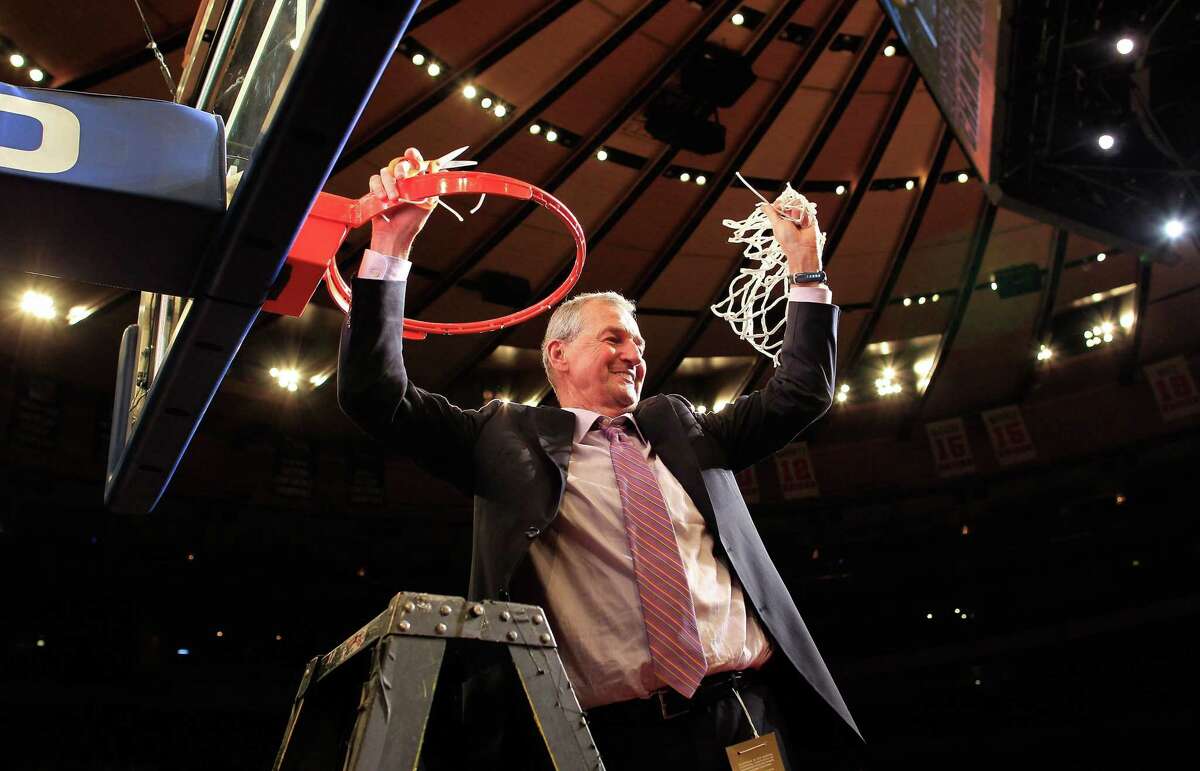 UConn coach Jim Calhoun cuts down the nets after beating Louisville to win the 2011 Big East championship at Madison Square Garden.