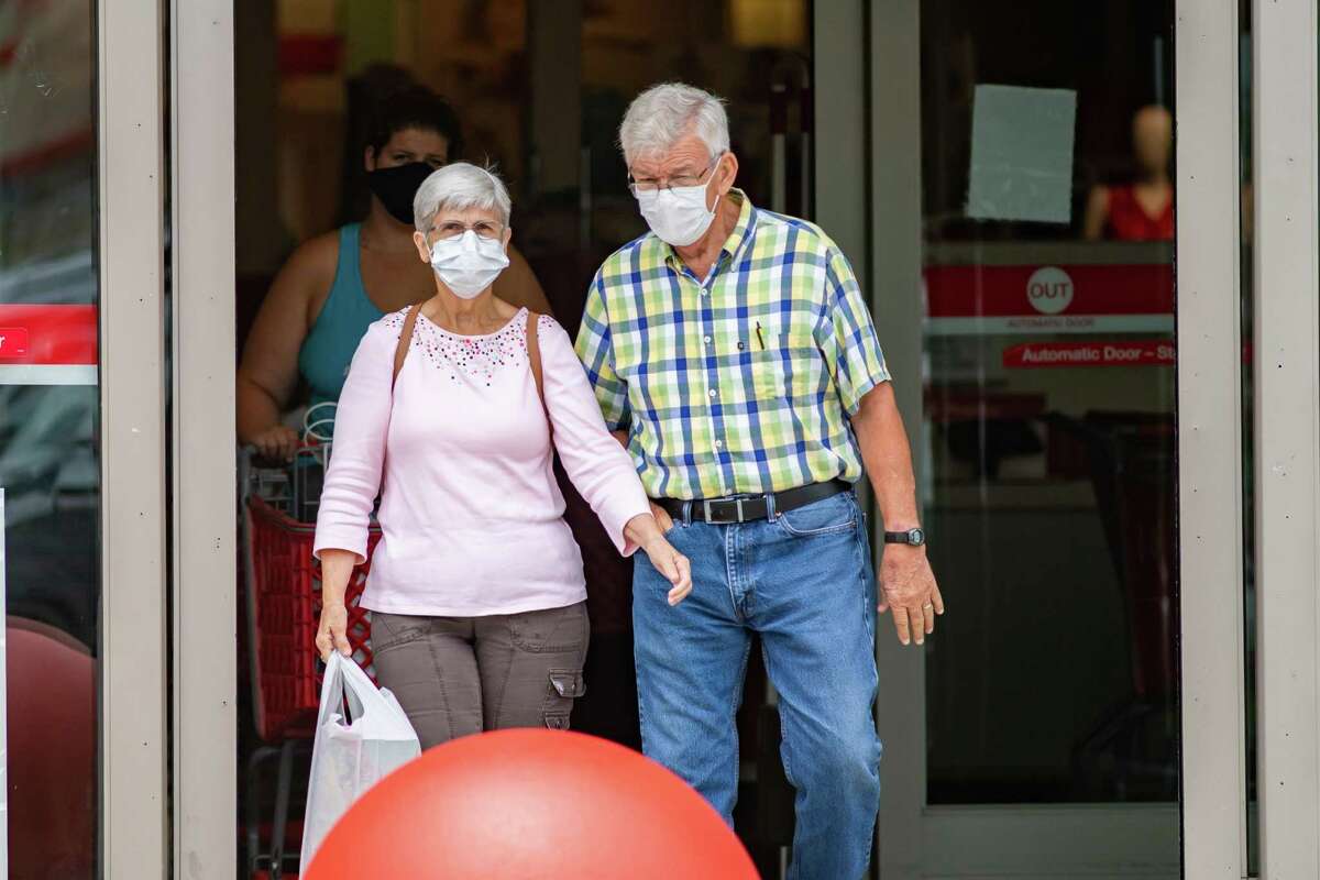Shoppers leave the Target store still wearing their masks. Photo made on June 24, 2020. Fran Ruchalski/The Enterprise