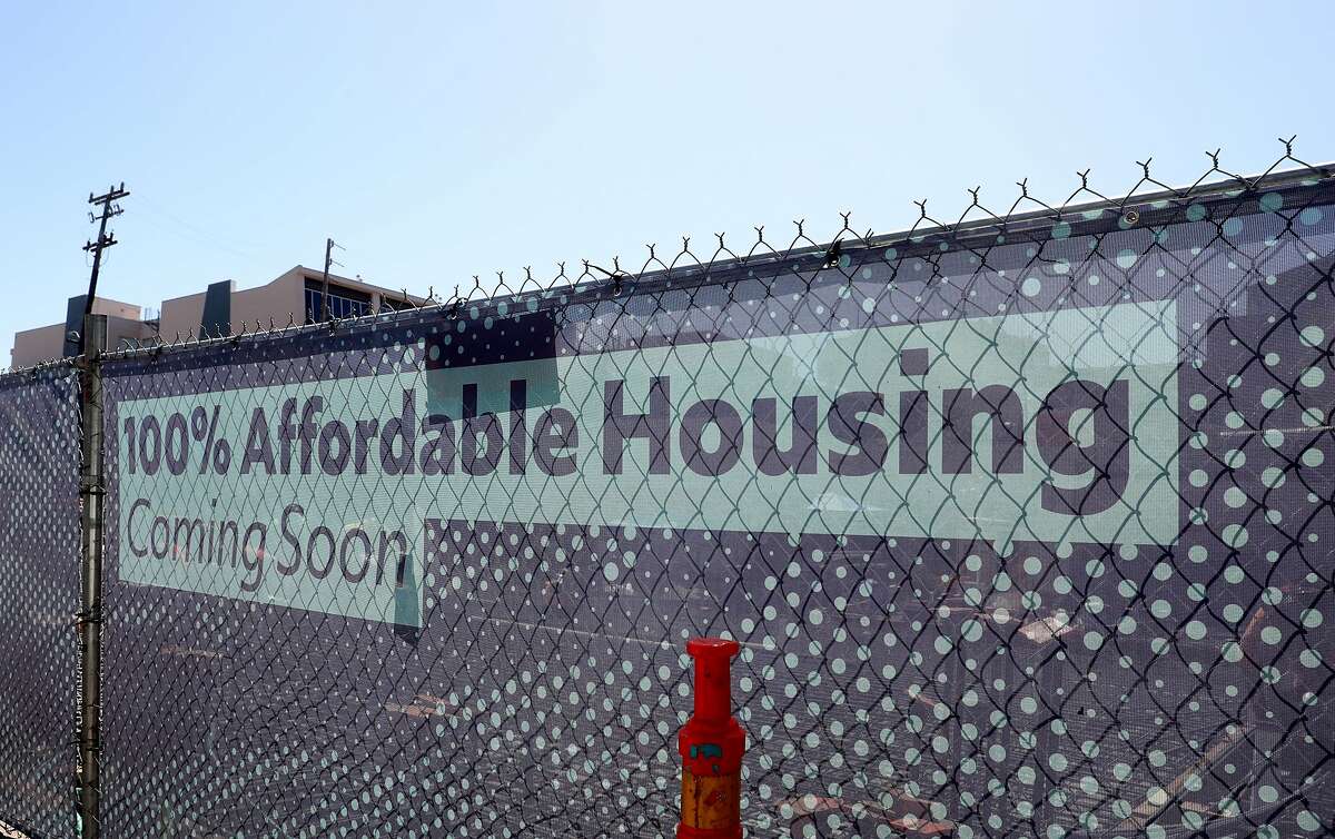 Signage for the modular affordable housing project at 833 Bryant St. seen on Tuesday, June 30, 2020, in San Francisco, Calif.