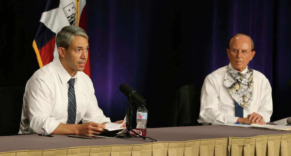 Mayor Ron Nirenberg (left) and Bexar County Judge Nelson Wolff give the daily city-county briefing on the latest coronavirus numbers. There were 1,268 new cases which gives the Bexar County and the city 12,065 confirmed positive cases of Covid-19. Judge Wolff will enact an order that will require businesses to screen customers with questions and a temperature check before entering their establishment.