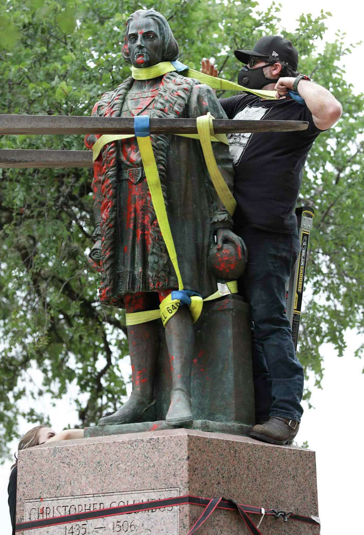 The Columbus statue, in place since 1957, was affixed to the pedestal with bolts that have since rusted out.