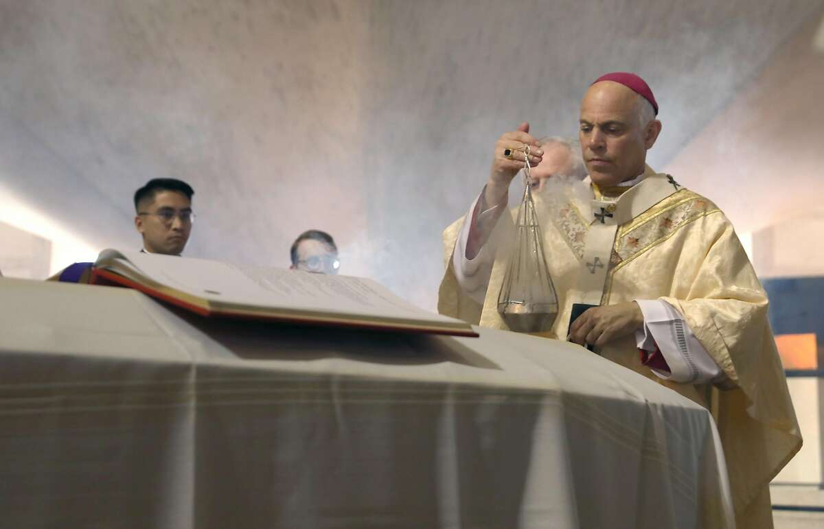Archbishop of San Francisco, the Most Reverend Salvatore J. Cordileone leads the prayer of commendation during the funeral Mass of archbishop emeritus and Cardinal William Joseph Cardinal Levada at the Cathedral of Saint Mary on Thursday, Oct. 24, 2019, in San Francisco, Calif.