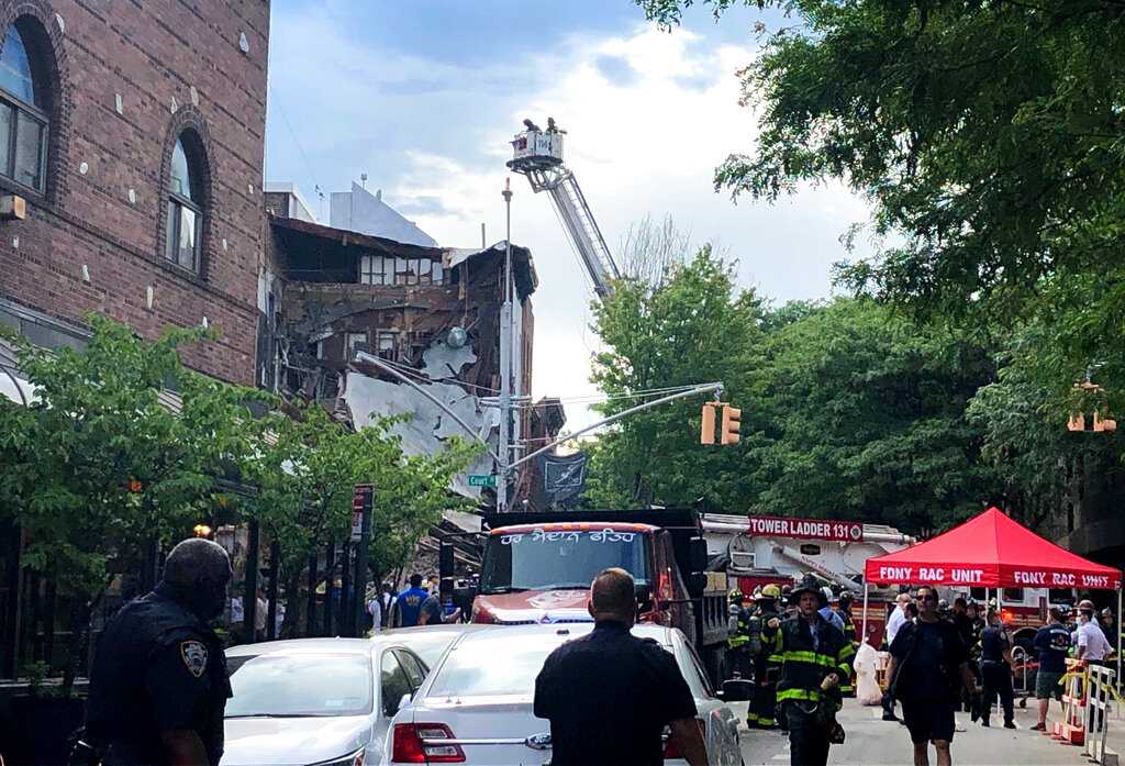New York City firefighters respond to building collapse