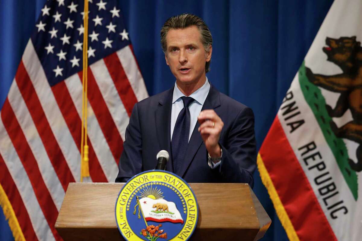 FILE — Gov. Gavin Newsom is poised to announce new restrictions Wednesday amid a surge in COVID-19 infections across the state. (AP Photo/Rich Pedroncelli, Pool, File)