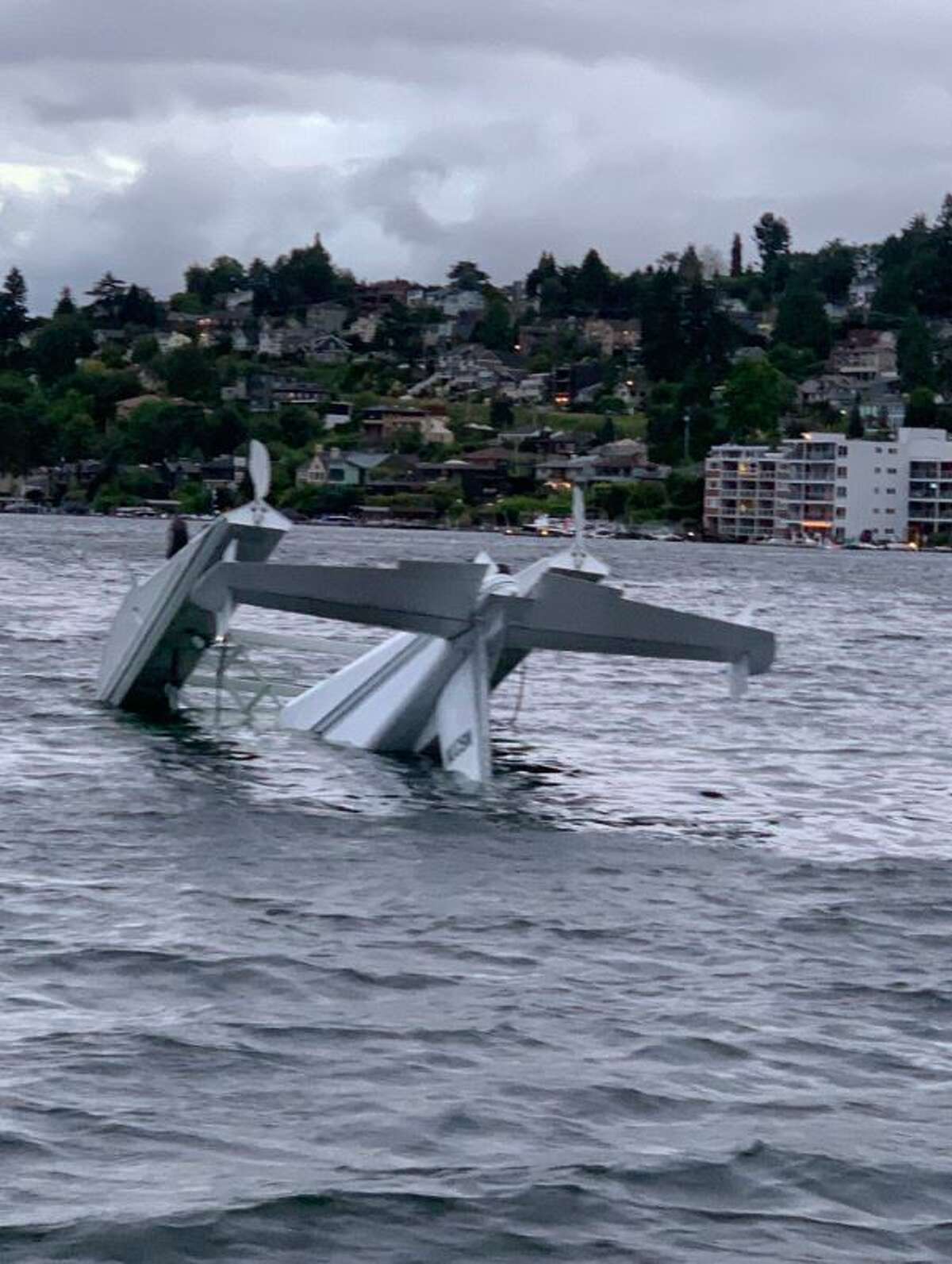 Two people rescued by nearby kayakers after seaplane crashes into Lake
