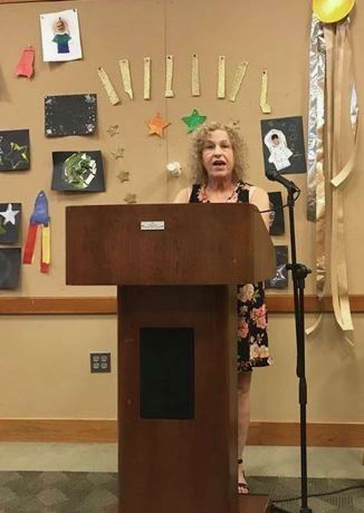 Stamford resident Barbara Ehrentreu reads a poem from her collection, “My Thoughts Turn to You,” at the Open Mic in Greenwich.