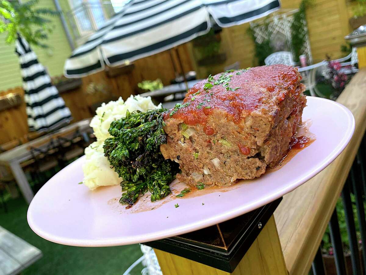 Meatloaf comes with mashed potatoes and broccolini at the new Tutti's A Place for Foodies, one of five great places to get meatloaf to comfort us during the COVID-19 pandemic.