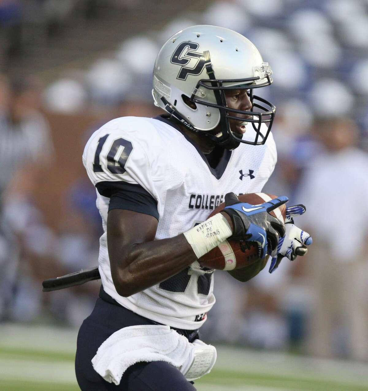 College Park's Charrod Henry pulls in a touchdown pass against Taylor at Rhodes Stadium in Katy. (Photo by Alan Warren)