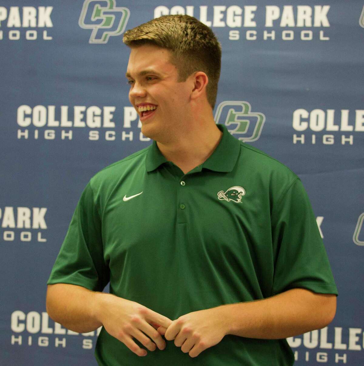 College Park offensive lineman Jackson Fort thanks friends, family, teachers and coaches after signing to play football for Tulane during a signing day ceremony at College Park West High School, Wednesday, Dec. 19, 2018, in The Woodlands.