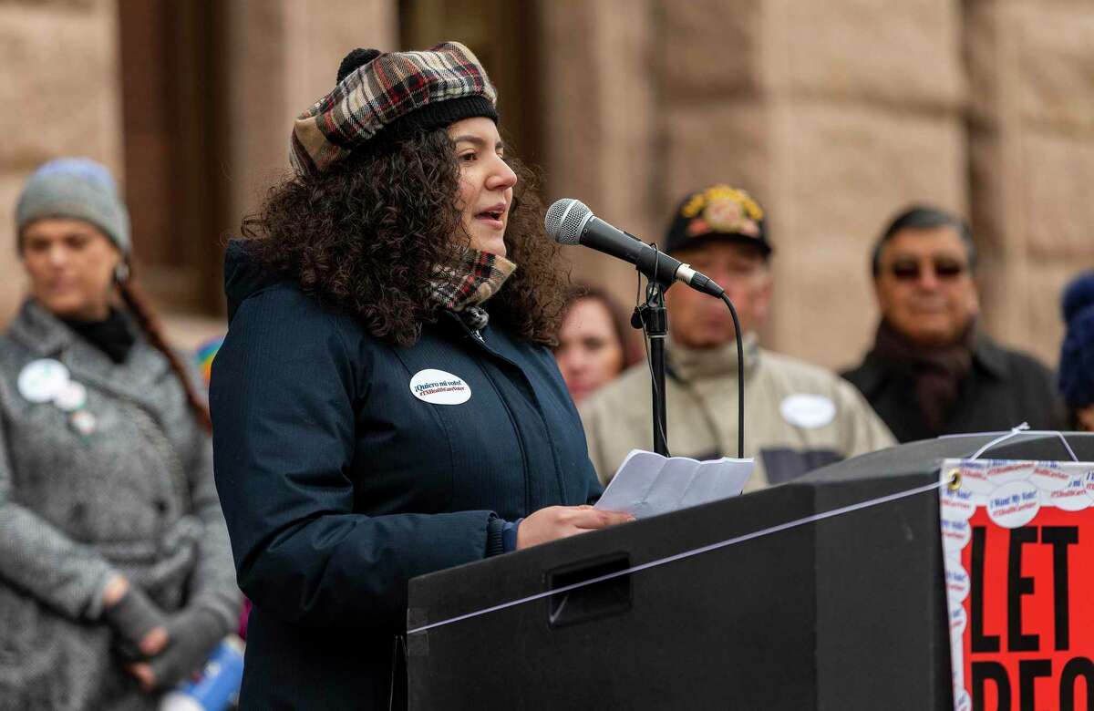 A UT student shares her story at a Medicaid rally in Austin last year. Texas’ failure to expand Medicaid has left 1.5 million adults uninsured.