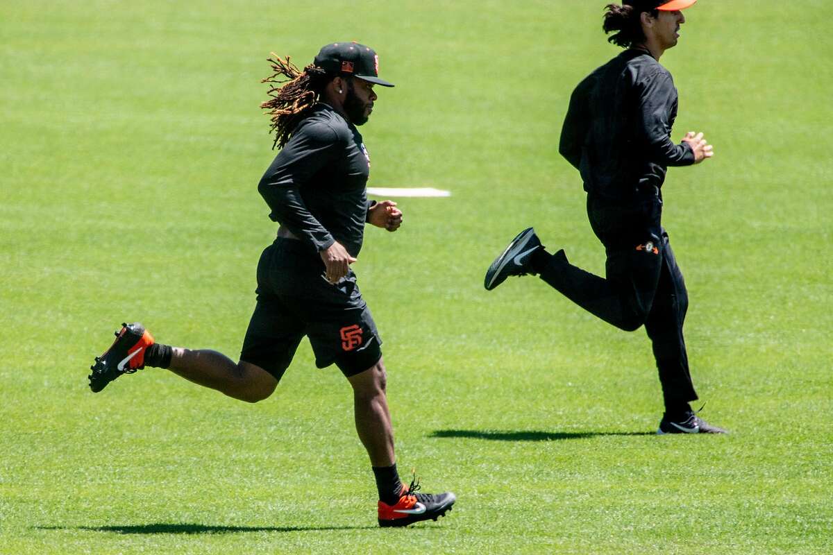 San Francisco Giants pitcher Johnny Cueto (#47) runs drills during the San Francisco Giants' summer training camp session at Oracle Park in San Francisco, Calif. Saturday, July 4, 2020. Due to COVID-19, the 2020 MLB season has been postponed with players just beginning to return for warmups and practices while wearing masks and keeping social distance.