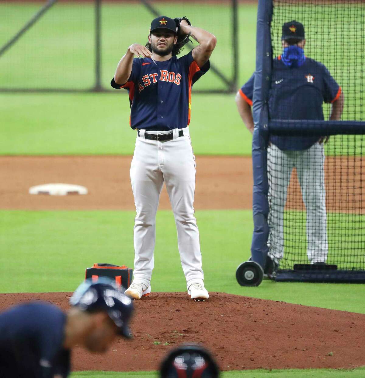 Houston Astros starting pitcher Lance McCullers Jr. throws a live batting practice during the Astros summer camp at Minute Maid Park, Saturday, July 4, 2020, in Houston.