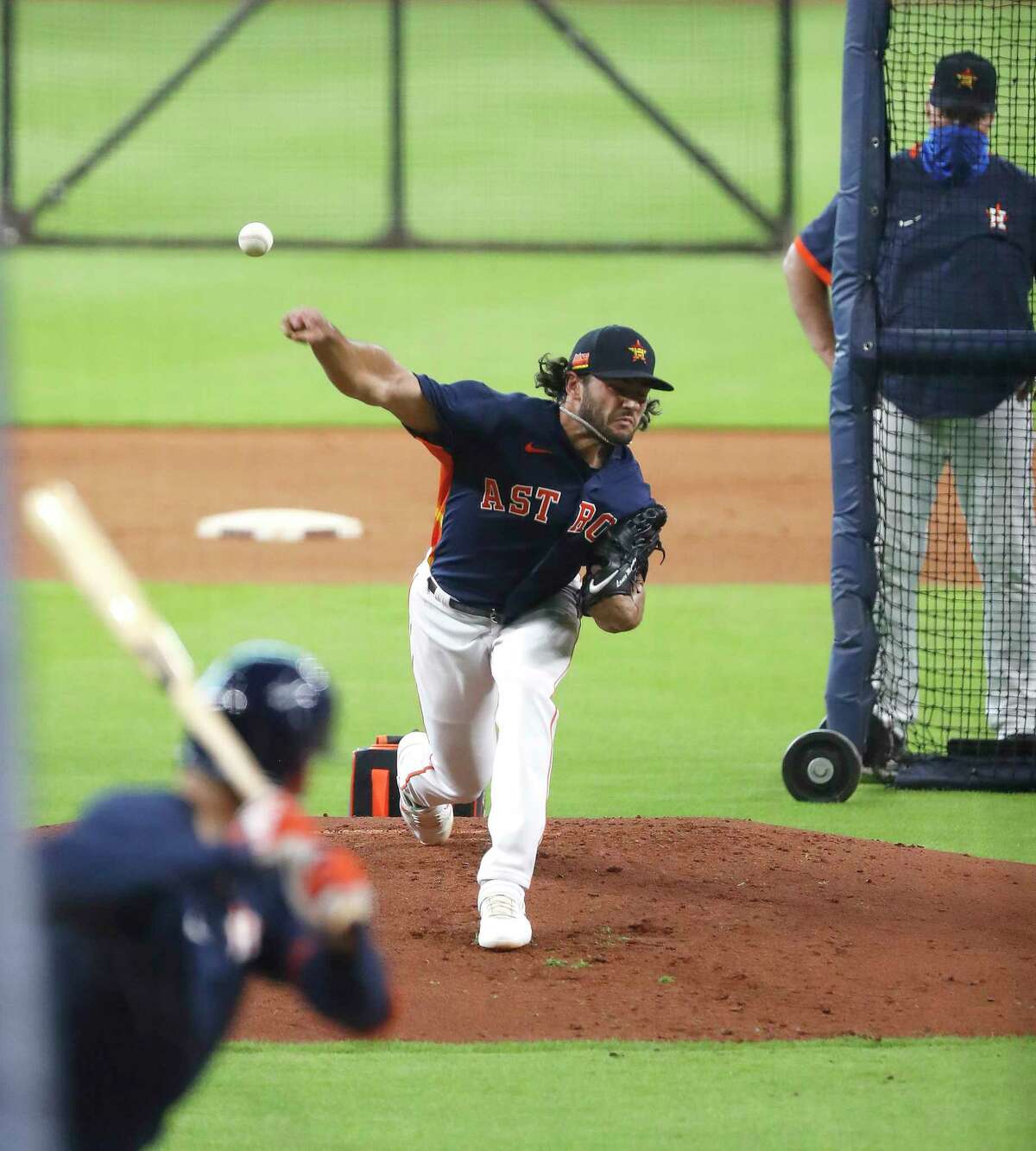 Houston Astros starting pitcher Lance McCullers Jr. throws a live batting practice to Carlos Correa during the Astros summer camp at Minute Maid Park, Saturday, July 4, 2020, in Houston.