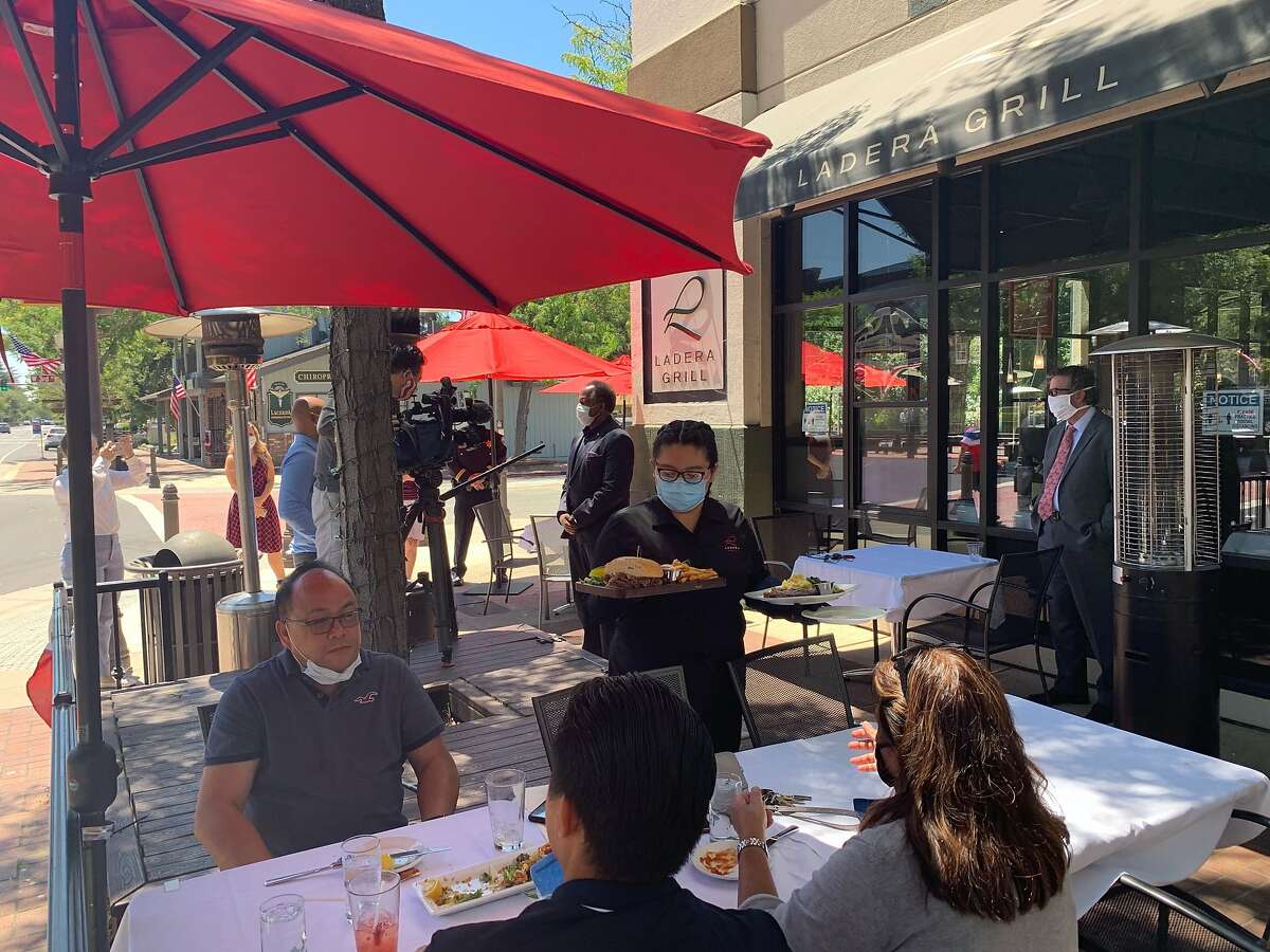 Patrons fine outdoors at Ladera Grill in Morgan hill on Saturday, July 4, 2020. The restaurant continued to offer outdoor service despite threats of fines from the state department of Alcohol Beverage Control.
